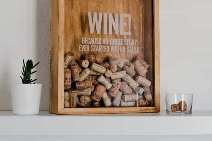 wine corks inside a frame